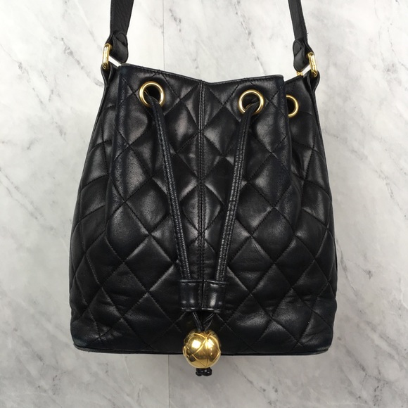 CHANEL Handbags - Vintage Chanel Black Quilted Drawstring Bucket Bag